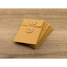 TRAVELERS Kraft Envelope S Vert w/String Orange