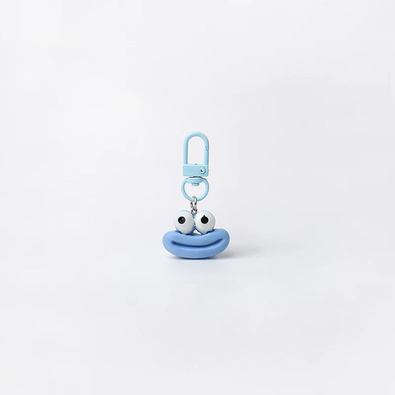 JIPPURI Keychain Cheeky Cartoon Face Blue