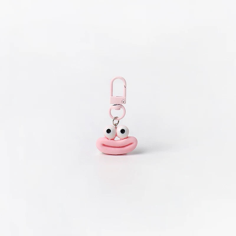 JIPPURI Keychain Cheeky Cartoon Face Pink